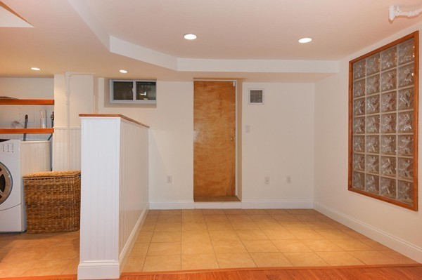 19 Highland Road Belmont, MA 02478 - Photo 23 of 30 a view of livingroom with washer and dryer