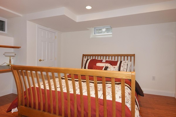 19 Highland Road Belmont, MA 02478 - Photo 24 of 30 a bedroom with a bed and a window