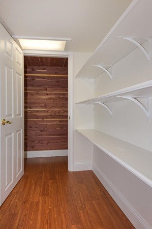 19 Highland Road Belmont, MA 02478 - Photo 26 of 30 a view of walk in closet with empty racks