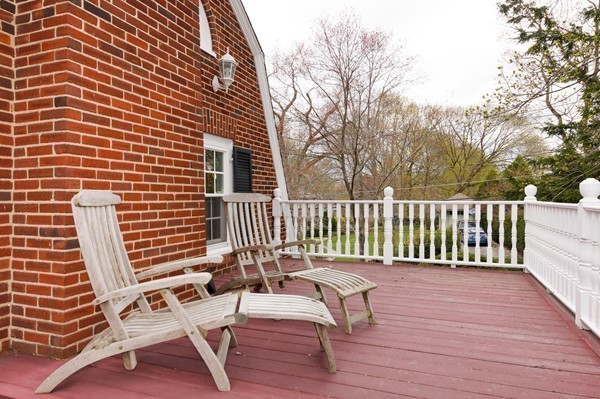 19 Highland Road Belmont, MA 02478 - Photo 27 of 30 a view of a chairs on wooden deck