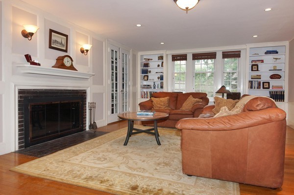 19 Highland Road Belmont, MA 02478 - Photo 3 of 30 a living room with furniture a window and a fireplace