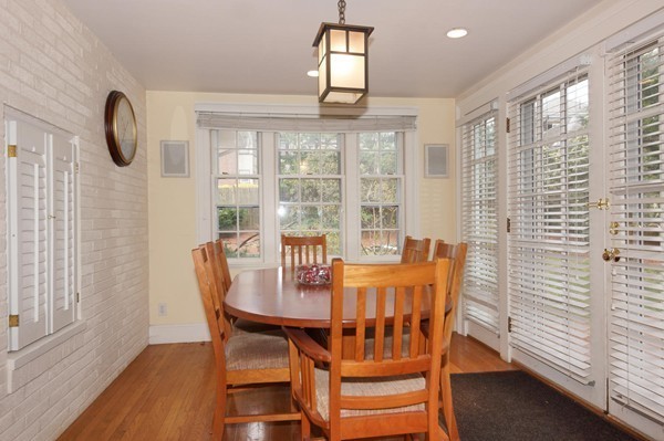 19 Highland Road Belmont, MA 02478 - Photo 7 of 30 a view of a dining room with furniture window and wooden floor