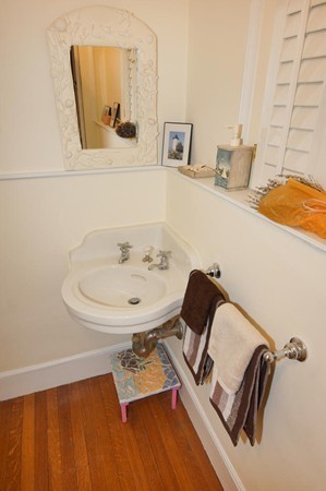 19 Highland Road Belmont, MA 02478 - Photo 10 of 30 a bathroom with a sink and a mirror
