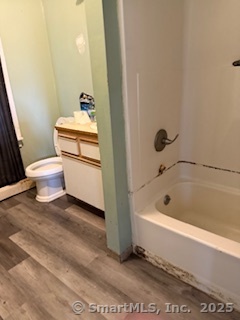 82 South Whitney Street Hartford, CT 06106 - Photo 5 of 7 a bathroom with a sink a toilet and bathtub