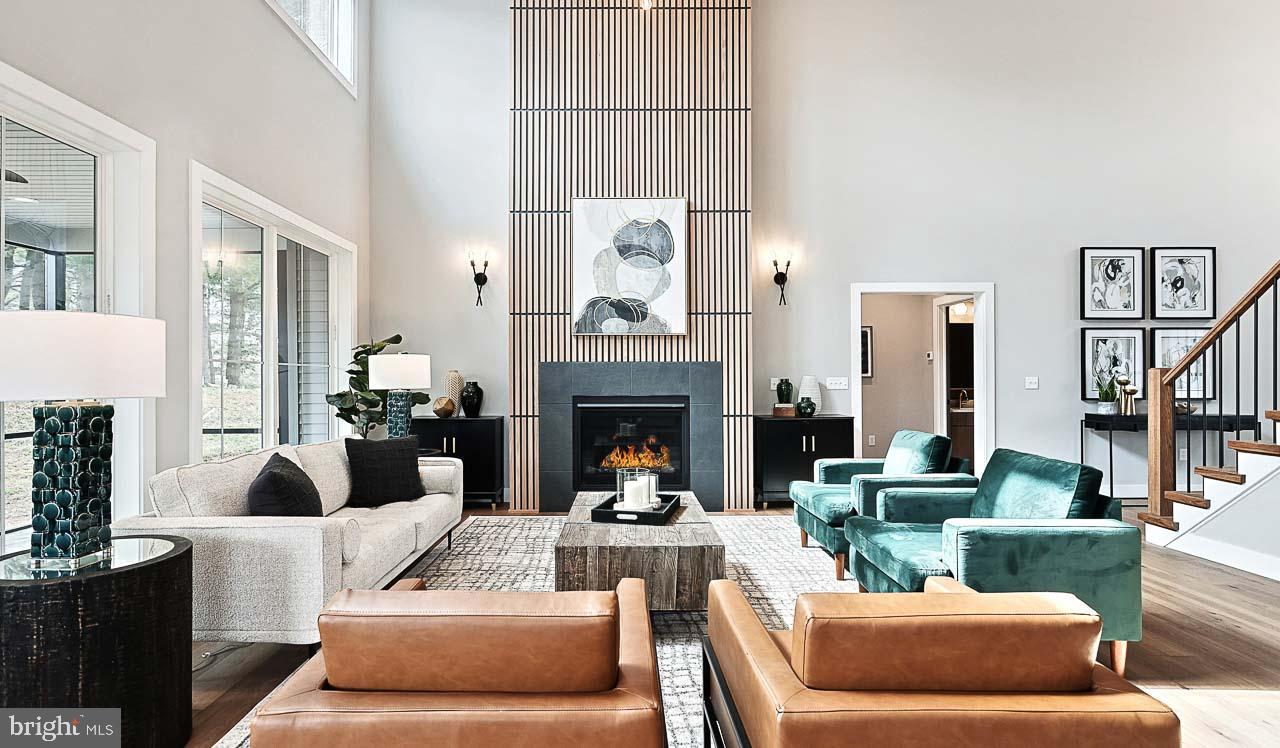 90 Tupelo Street Lititz, PA 17543 - Photo 12 of 38 a living room with furniture and a fireplace