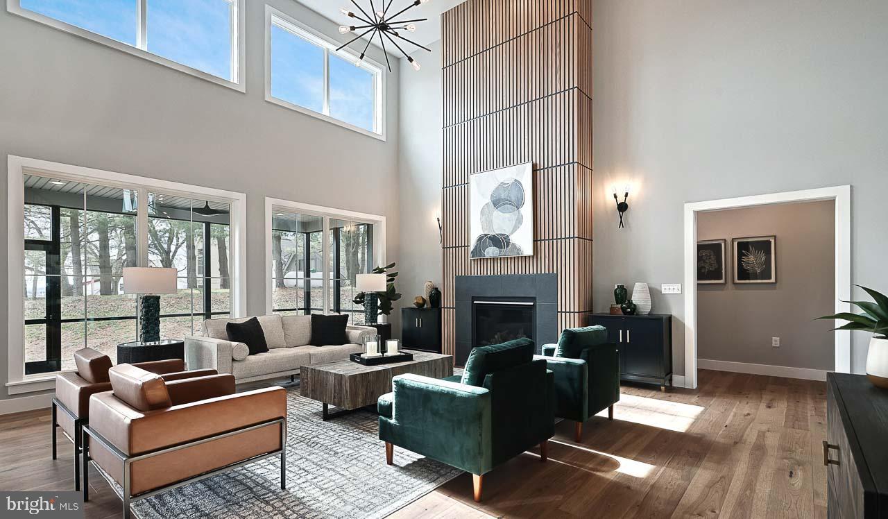 90 Tupelo Street Lititz, PA 17543 - Photo 2 of 38 a living room with furniture and a fireplace
