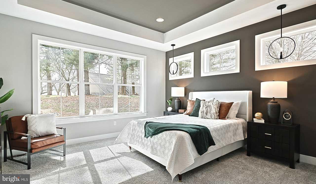 90 Tupelo Street Lititz, PA 17543 - Photo 21 of 38 a bedroom with a bed and wooden floor