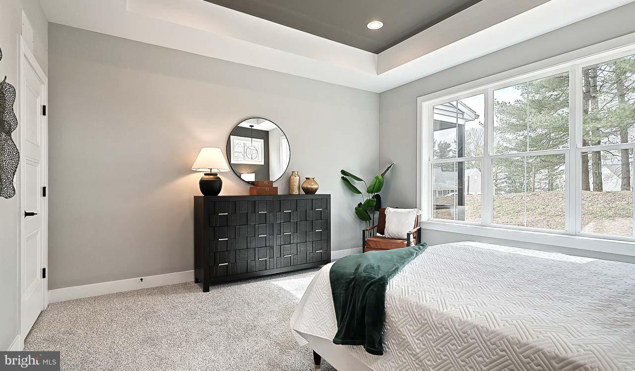 90 Tupelo Street Lititz, PA 17543 - Photo 23 of 38 a bedroom with a bed and a dresser