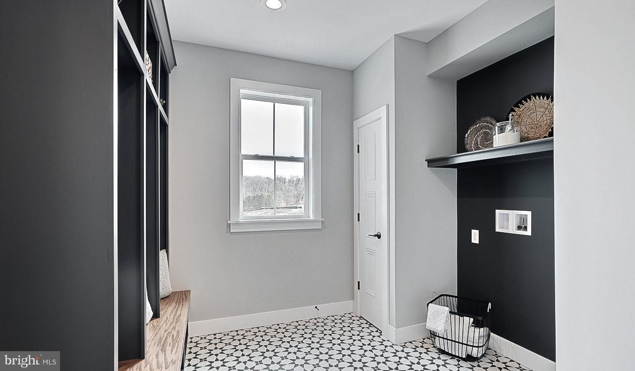 90 Tupelo Street Lititz, PA 17543 - Photo 26 of 38 a view of a livingroom with wooden floor and a bathroom