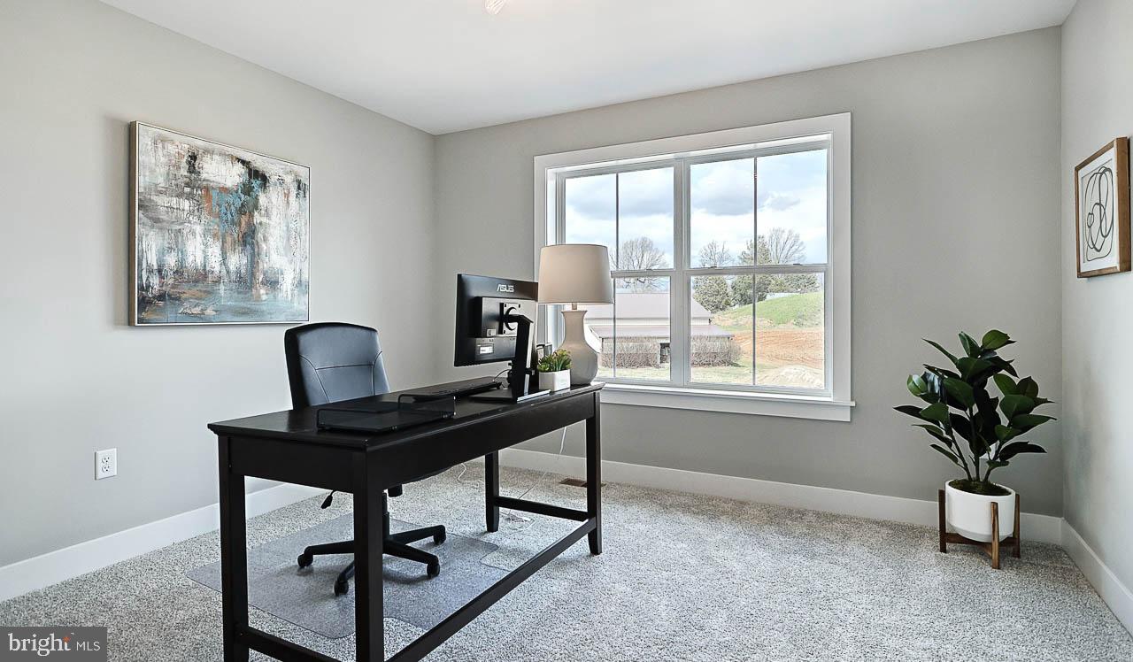 90 Tupelo Street Lititz, PA 17543 - Photo 31 of 38 a view of a workspace with a window and a chair