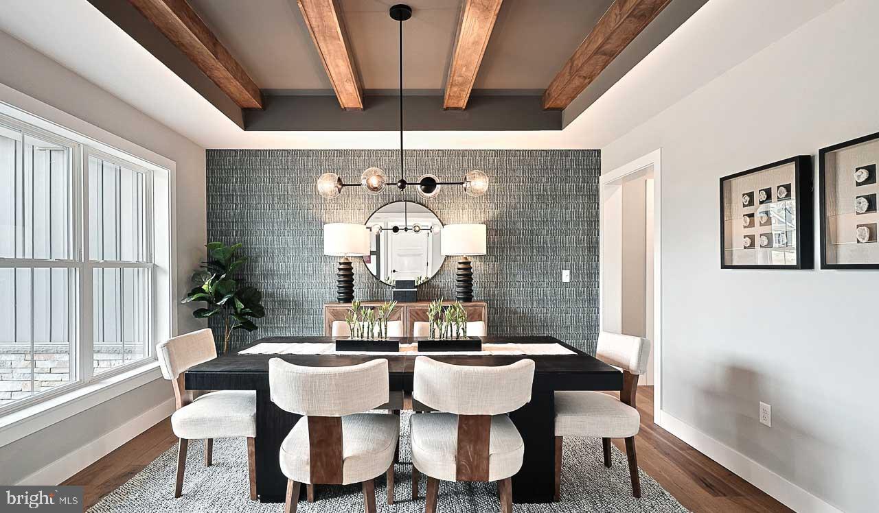 90 Tupelo Street Lititz, PA 17543 - Photo 6 of 38 a dining room with furniture a chandelier and wooden floor
