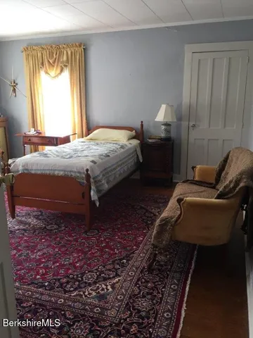 a bathroom with a double vanity sink and mirror
