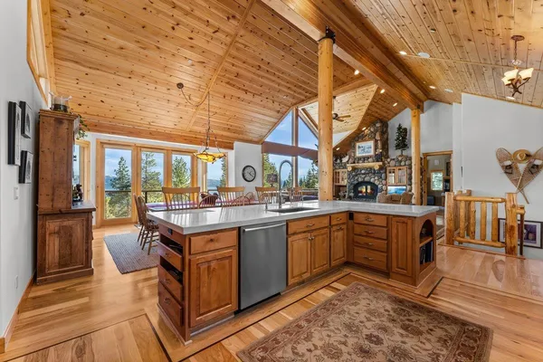 a kitchen with stainless steel appliances granite countertop a stove and a refrigerator