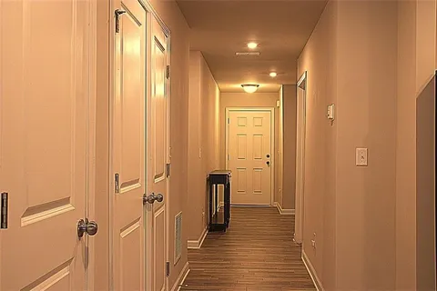 a bathroom with a glass door shower