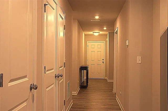 a bathroom with a glass door shower
