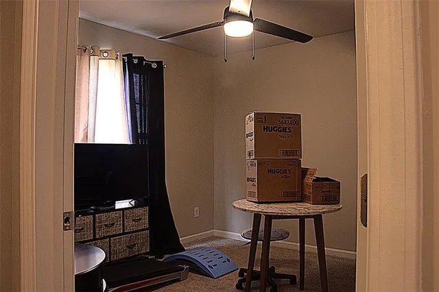 a room with furniture and a window