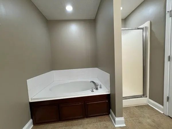 a bathroom with a sink and a bathtub