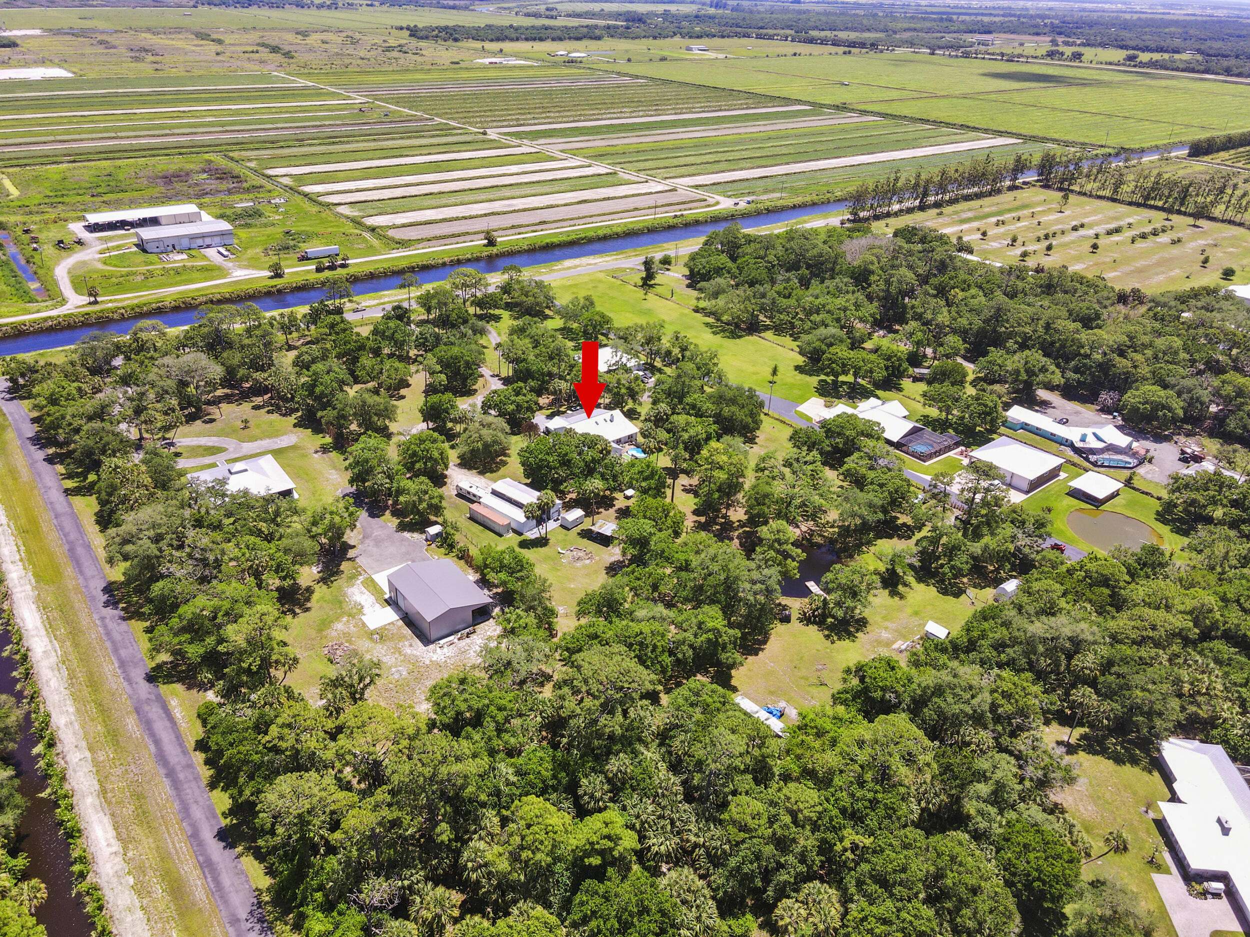 6289 South Header Canal Road Port St. Lucie, FL 34987 - Photo 40 of 49 76_dji_fly_20260421_125800_562_177679069