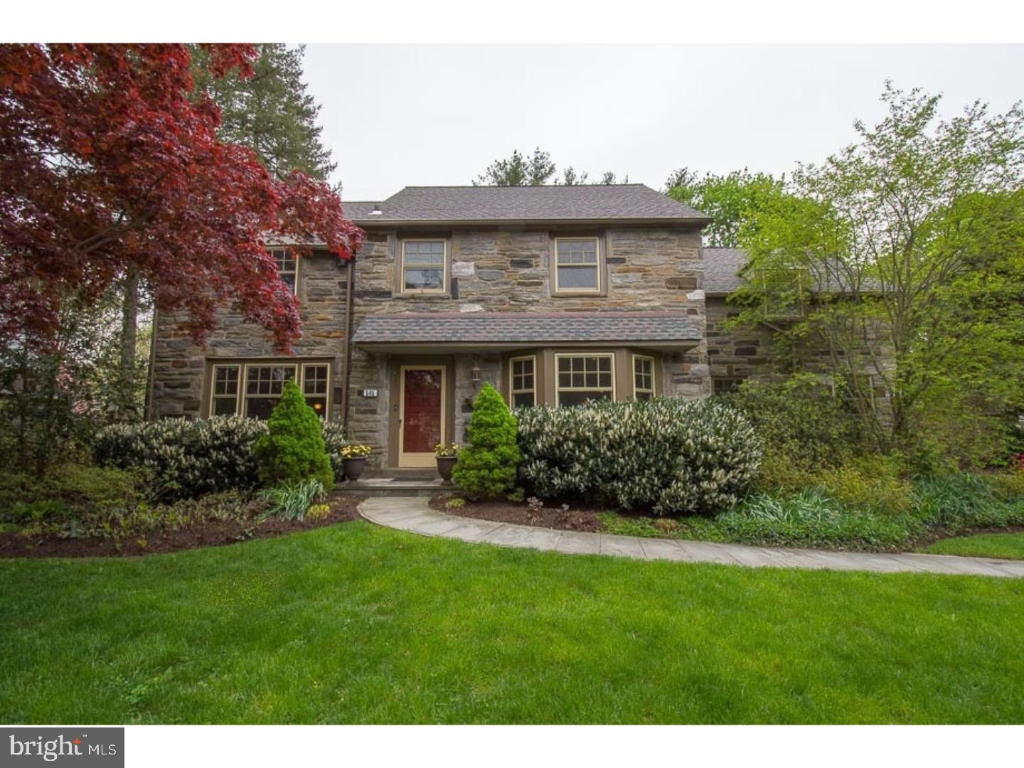 545 Manor Road Wynnewood, PA 19096 - Photo 2 of 25 a front view of a house with a yard