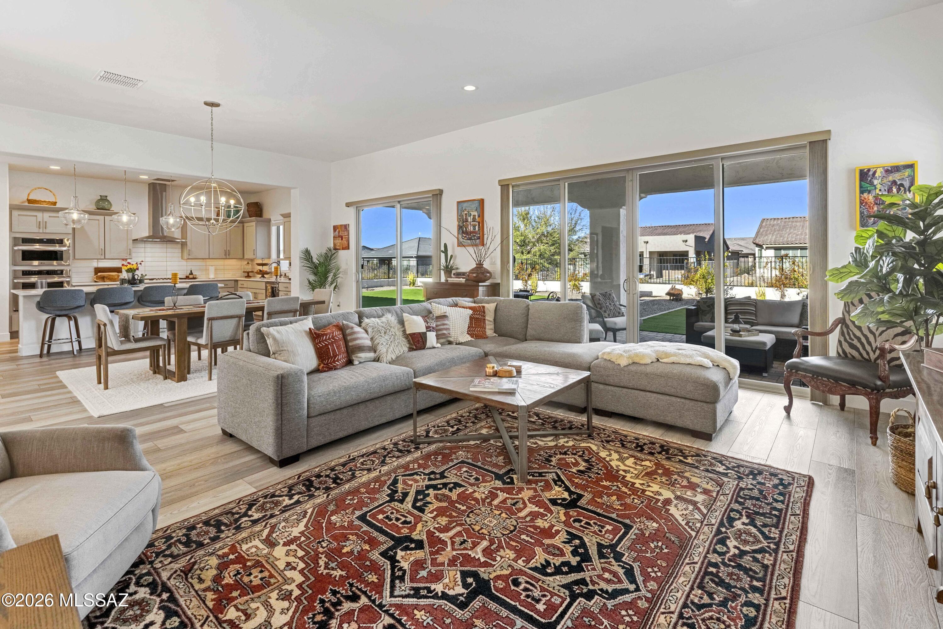 61460 East Shale Road Oracle, AZ 85623 - Photo 13 of 33 a living room with furniture and a large window