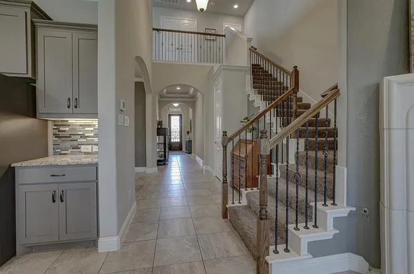 a view of entryway and hall with a window