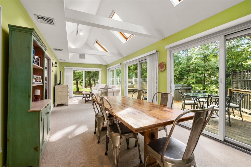 9 Arbor Circle Natick, MA 01760 - Photo 14 of 34 a view of a dining room with furniture window and wooden floor
