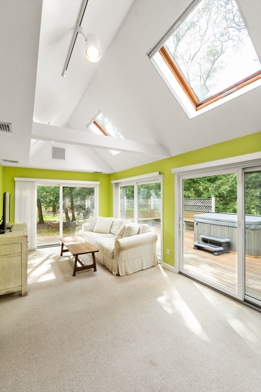 9 Arbor Circle Natick, MA 01760 - Photo 15 of 34 a living room with furniture and a large window