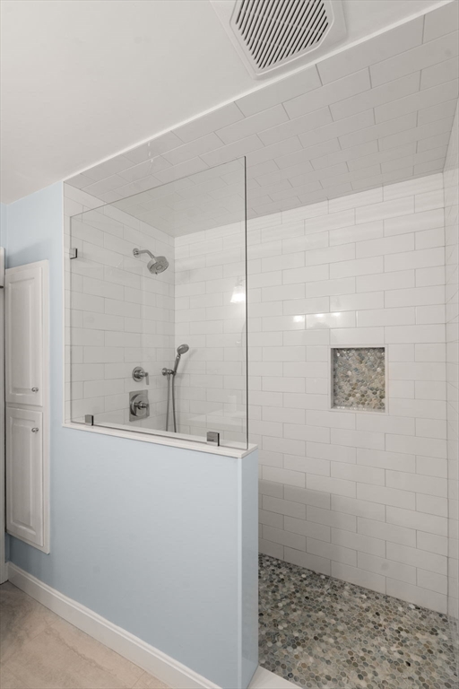 9 Arbor Circle Natick, MA 01760 - Photo 20 of 34 a bathroom with a sink and a mirror