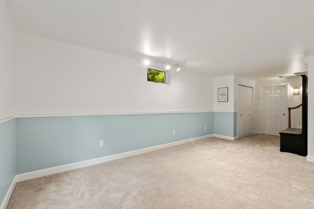 9 Arbor Circle Natick, MA 01760 - Photo 25 of 34 an empty room with windows