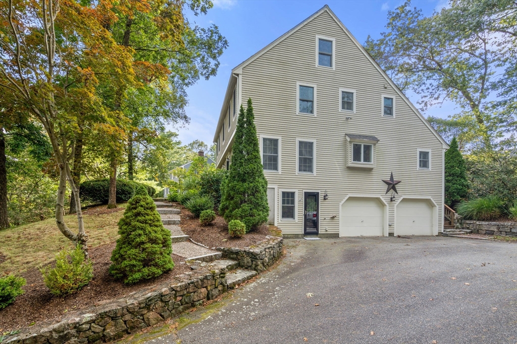 9 Arbor Circle Natick, MA 01760 - Photo 3 of 34 a view of a house with a yard