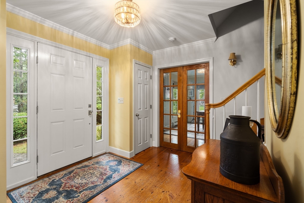 9 Arbor Circle Natick, MA 01760 - Photo 5 of 34 a view of entryway with wooden floor