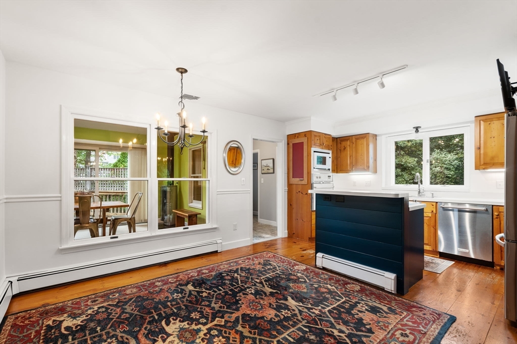 9 Arbor Circle Natick, MA 01760 - Photo 10 of 34 a living room with a dresser and a window
