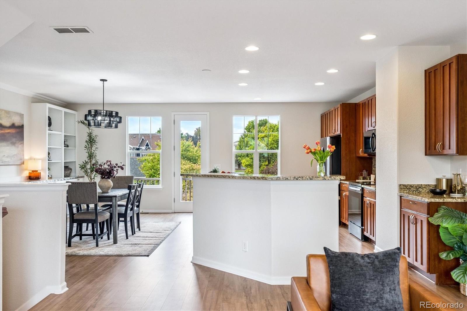 11815 Stuart Place Westminster, CO 80031 - Photo 12 of 36 a view of kitchen with dining table and chairs