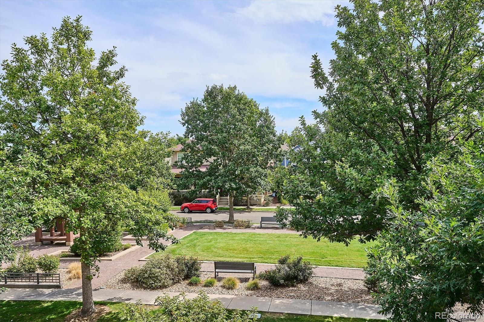 11815 Stuart Place Westminster, CO 80031 - Photo 17 of 36 a green field with lots of trees in it