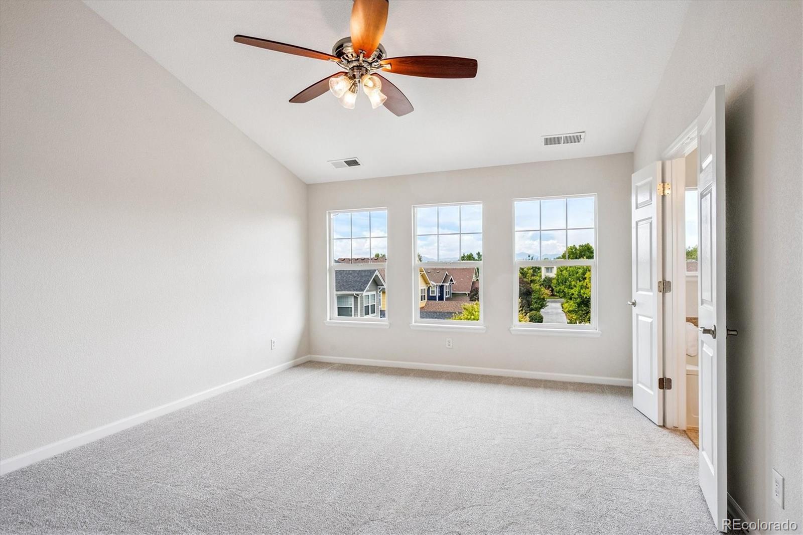 11815 Stuart Place Westminster, CO 80031 - Photo 21 of 36 a view of an empty room with a window