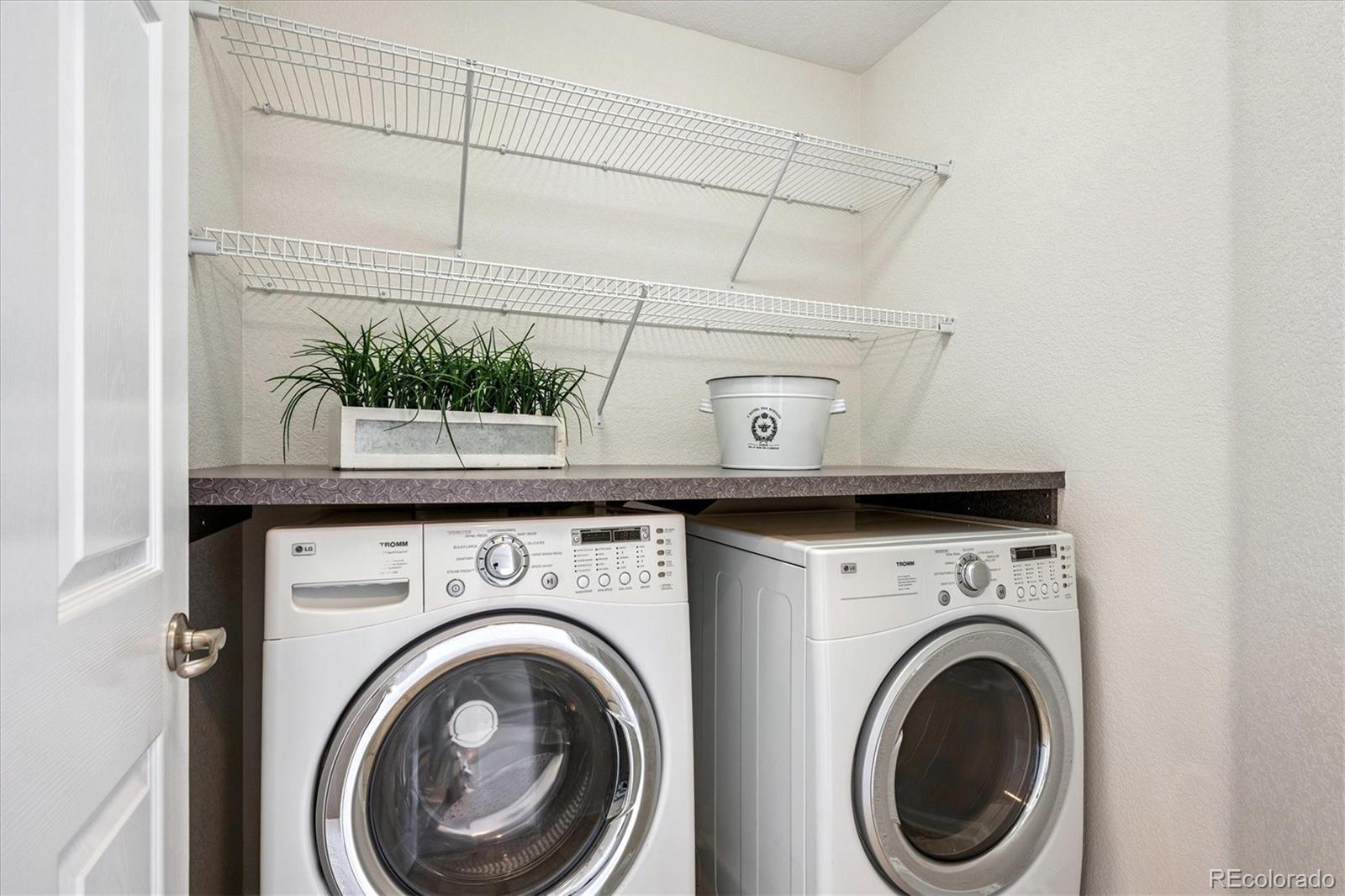 11815 Stuart Place Westminster, CO 80031 - Photo 26 of 36 a utility room with dryer and washer