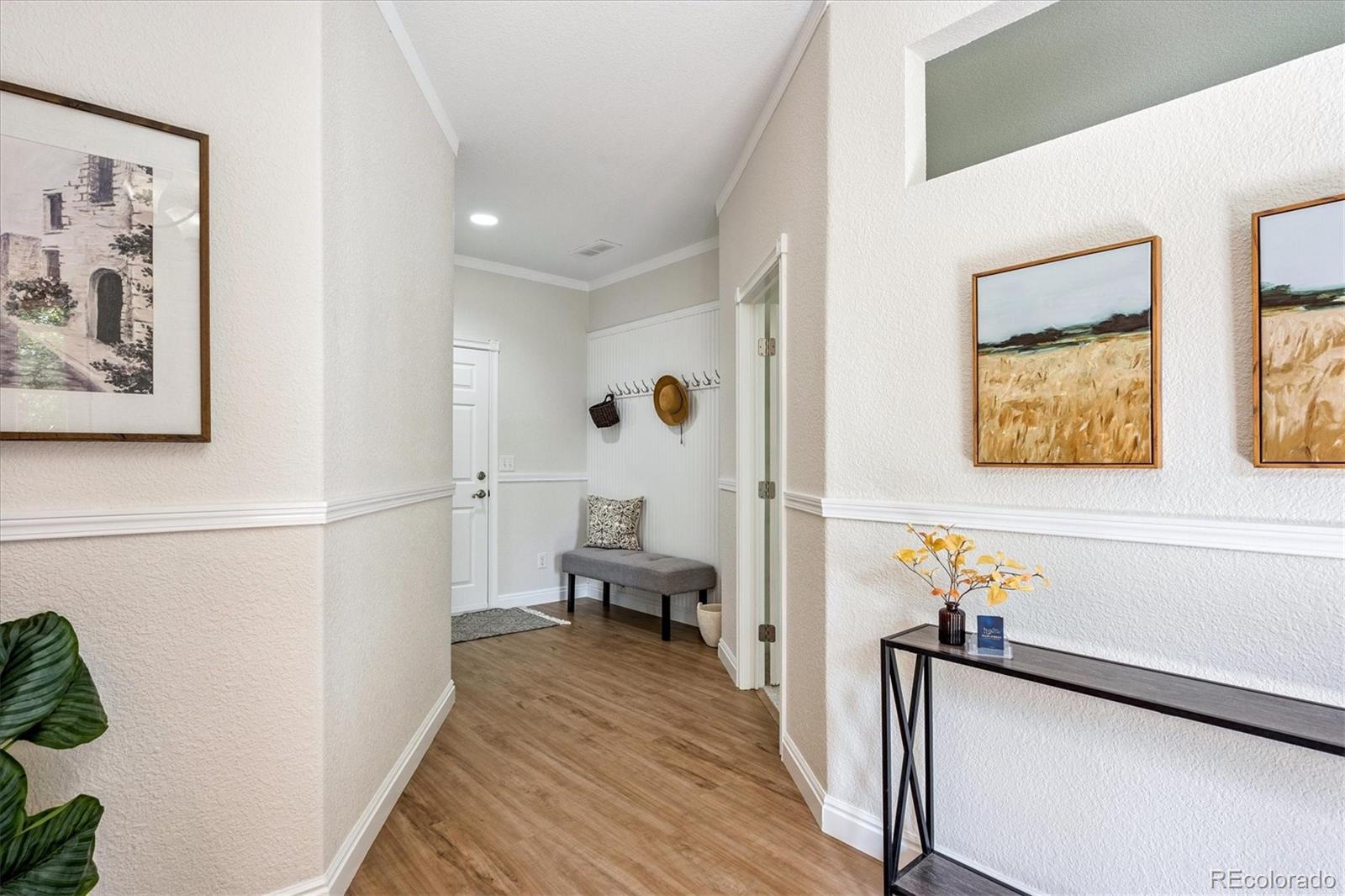 11815 Stuart Place Westminster, CO 80031 - Photo 28 of 36 a view of a hallway with seating area