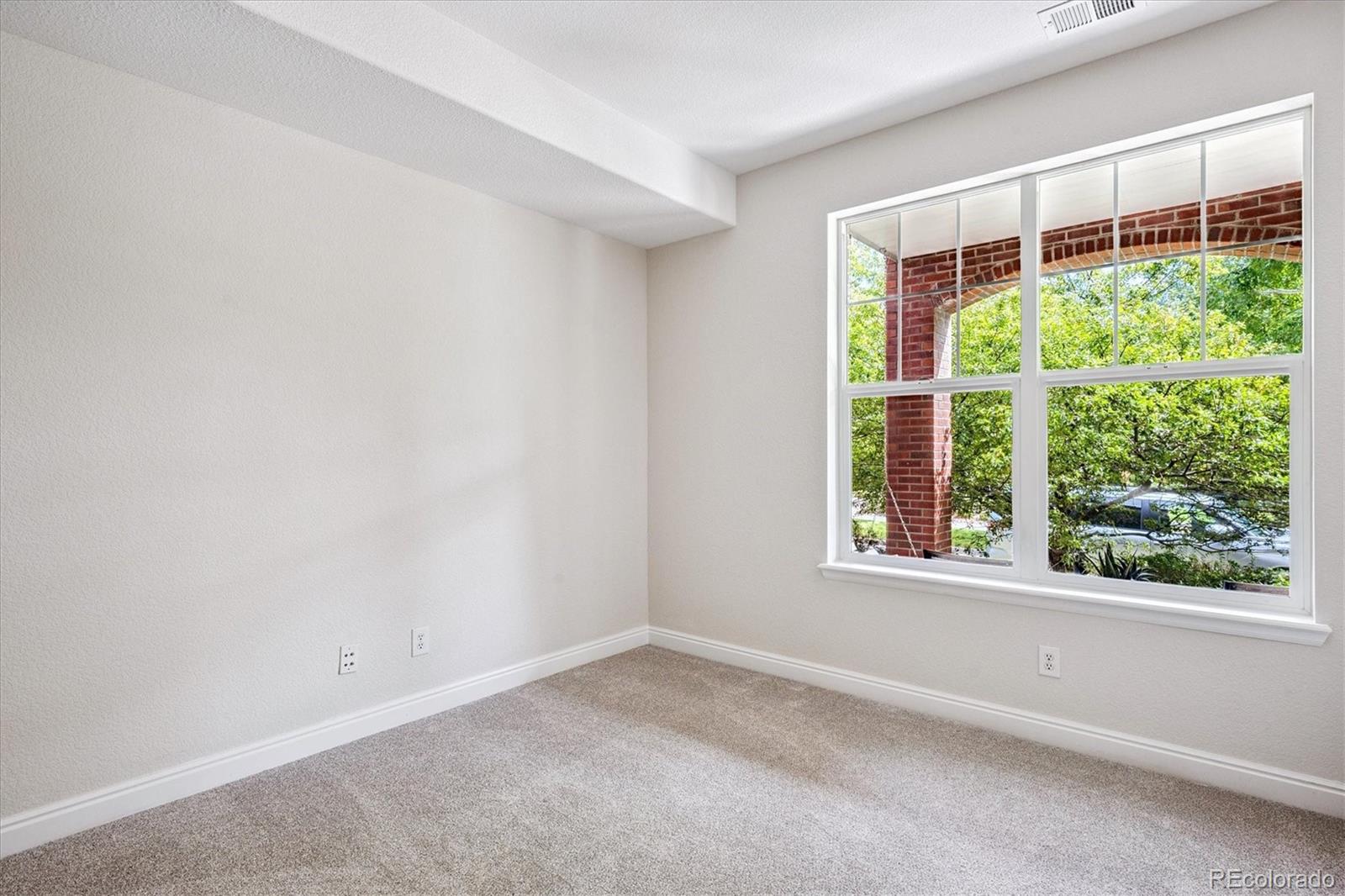 11815 Stuart Place Westminster, CO 80031 - Photo 29 of 36 an empty room with a window