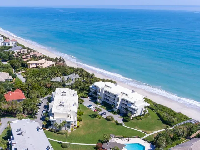 a bed sitting in a bedroom next to a yard