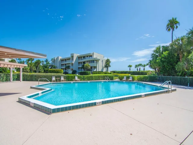 a view of a house with a swimming pool