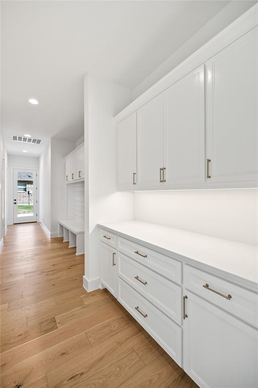 229 Bel Grand Road Haslet, TX 76052 - Photo 24 of 37 a view of a kitchen with wooden floor