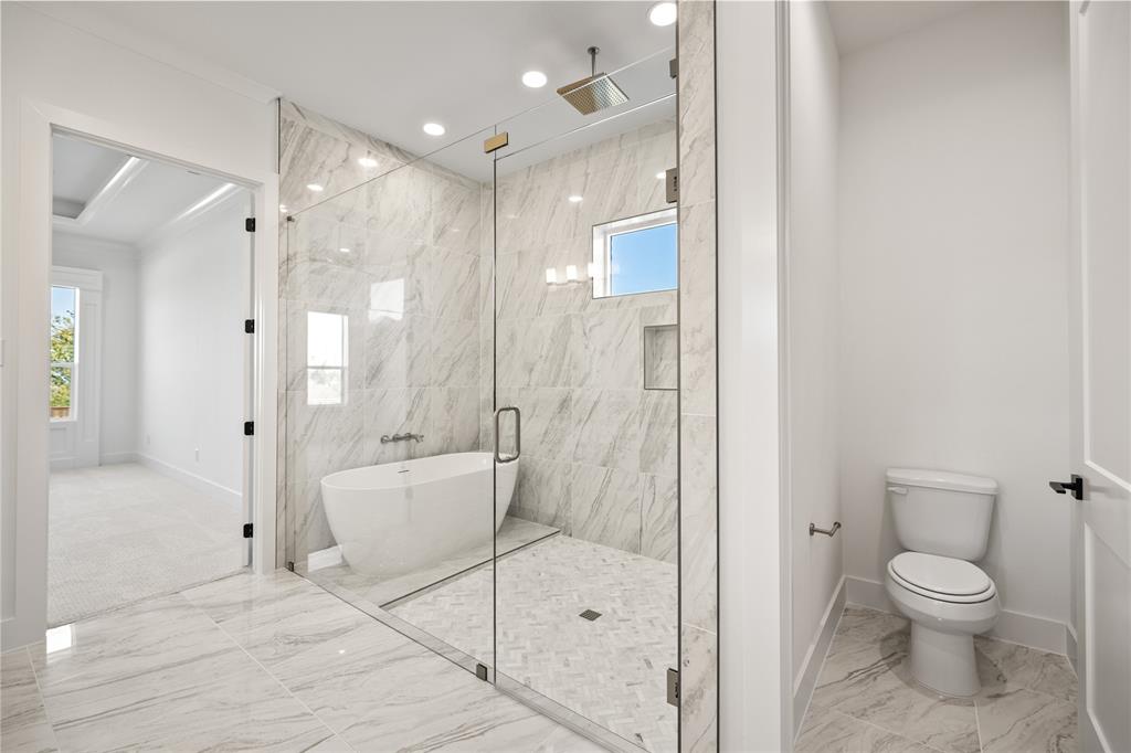 229 Bel Grand Road Haslet, TX 76052 - Photo 29 of 37 a bathroom with a shower a toilet and a shower