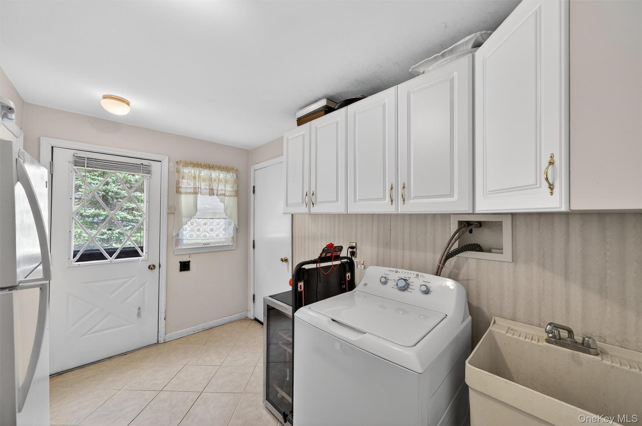 449 West Mombasha Road Monroe, NY 10950 - Photo 19 of 39 a view of storage and utility room with washer and dryer