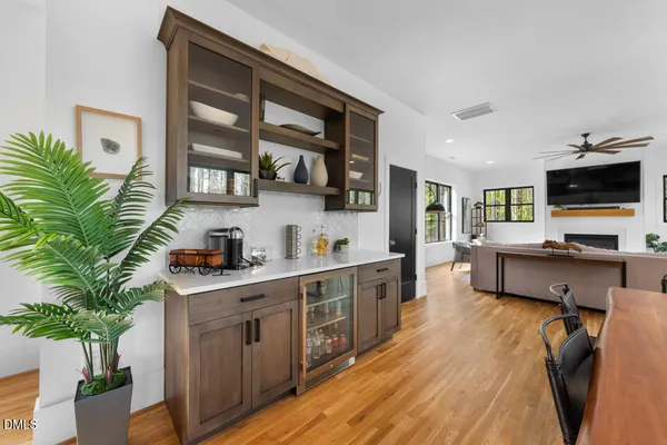 a kitchen with stainless steel appliances a sink and a refrigerator