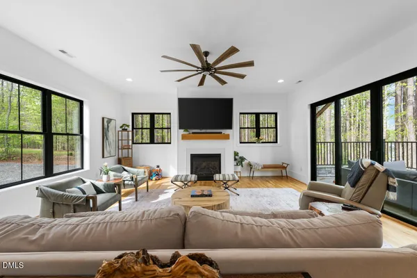 a workspace with furniture window and wooden floor