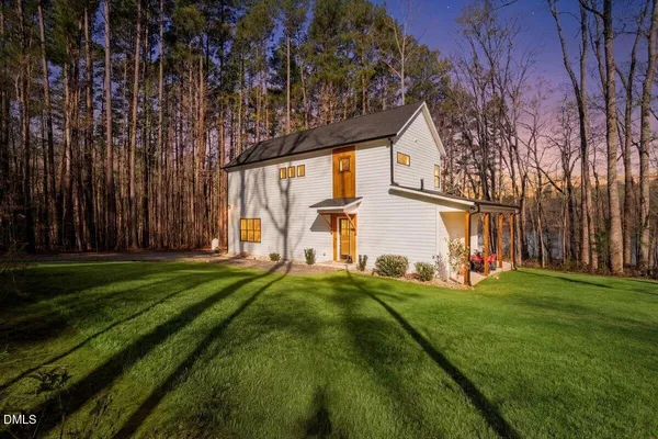 a view of a back yard of the house