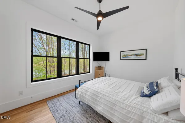a view of a bedroom from a hallway