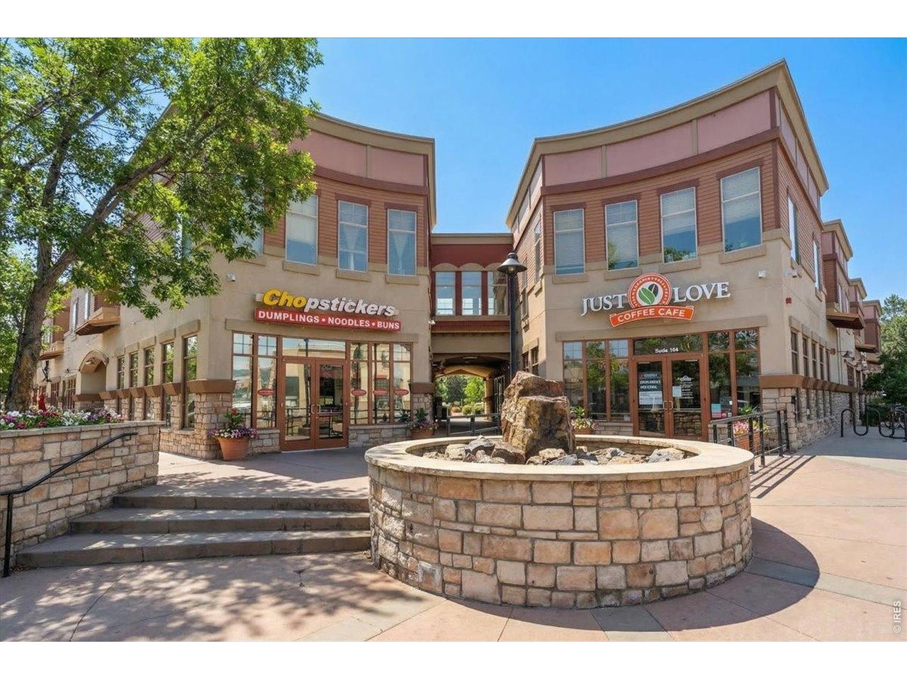 1625 West Elizabeth Street, Unit 2 Fort Collins, CO 80521 - Photo 27 of 29 a view of a building with a fountain and a fountain