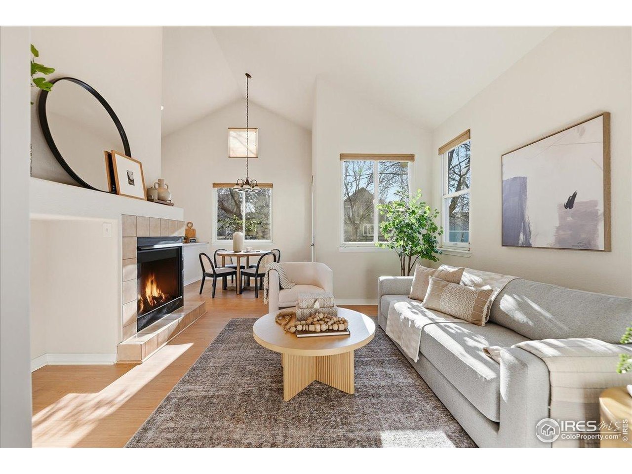 2287 Trestle Road Fort Collins, CO 80525 - Photo 1 of 40 a living room with furniture a window and a fireplace