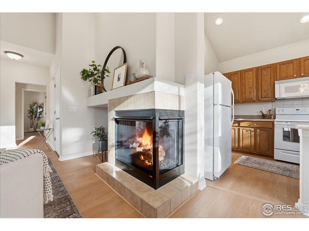 2287 Trestle Road Fort Collins, CO 80525 - Photo 11 of 40 a living room with furniture and a fireplace